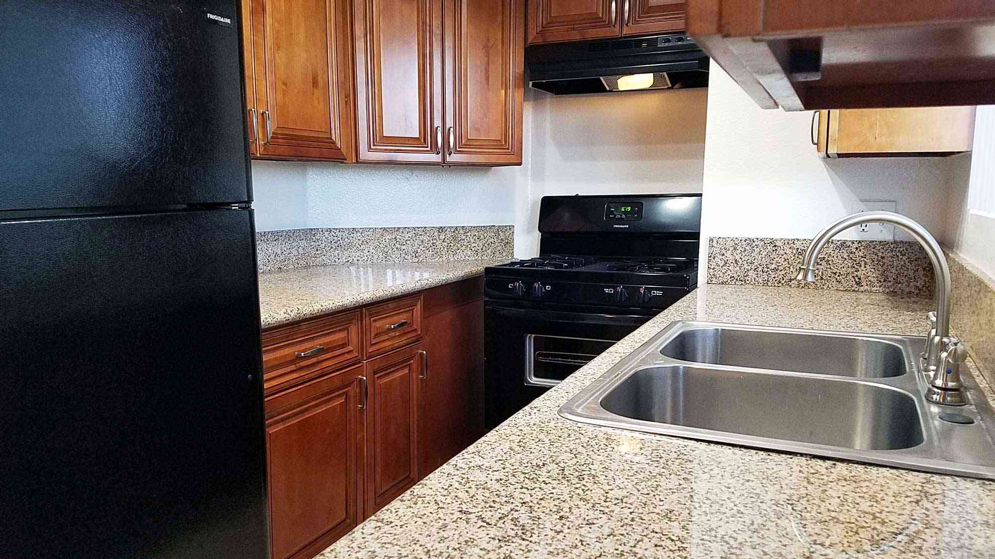 renovated kitchen with granite countertops